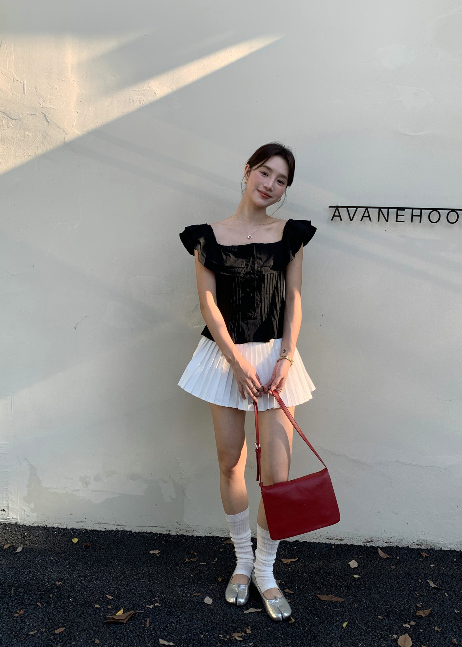 Lana Ruffle Pleated Top in Black