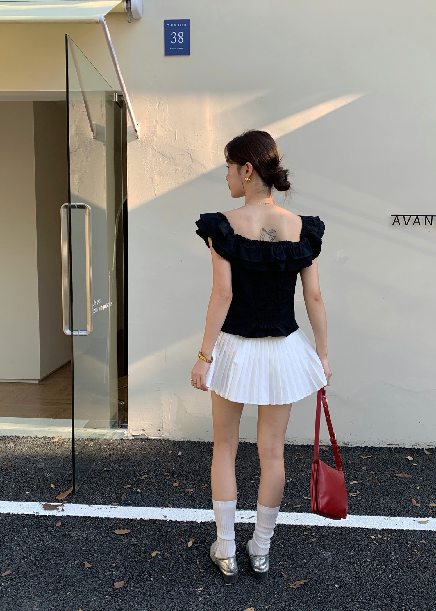 Lana Ruffle Pleated Top in Black