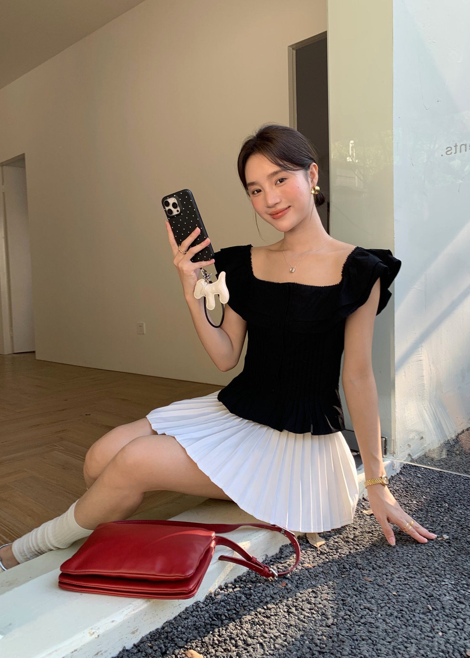 Lana Ruffle Pleated Top in Black