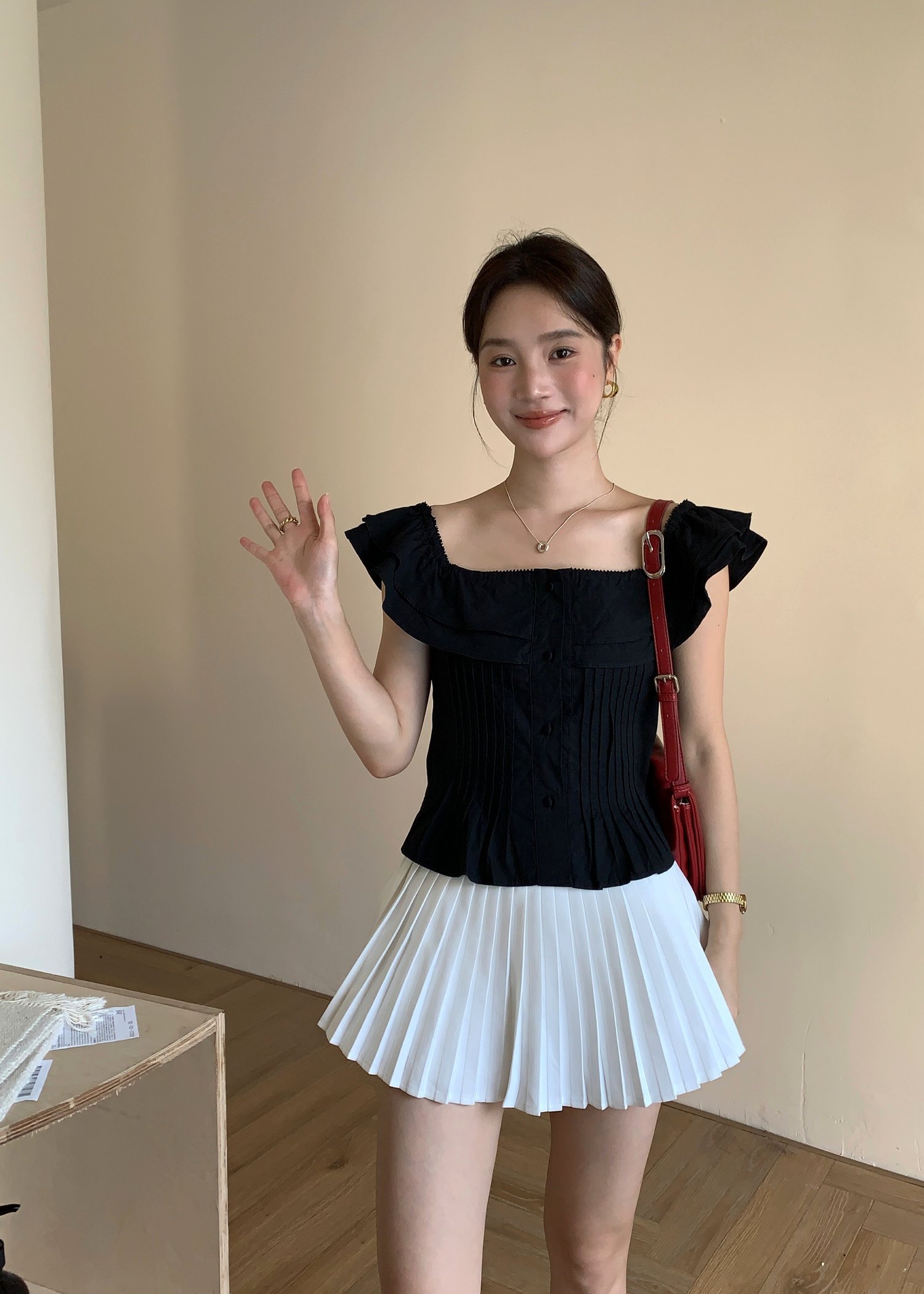 Lana Ruffle Pleated Top in Black