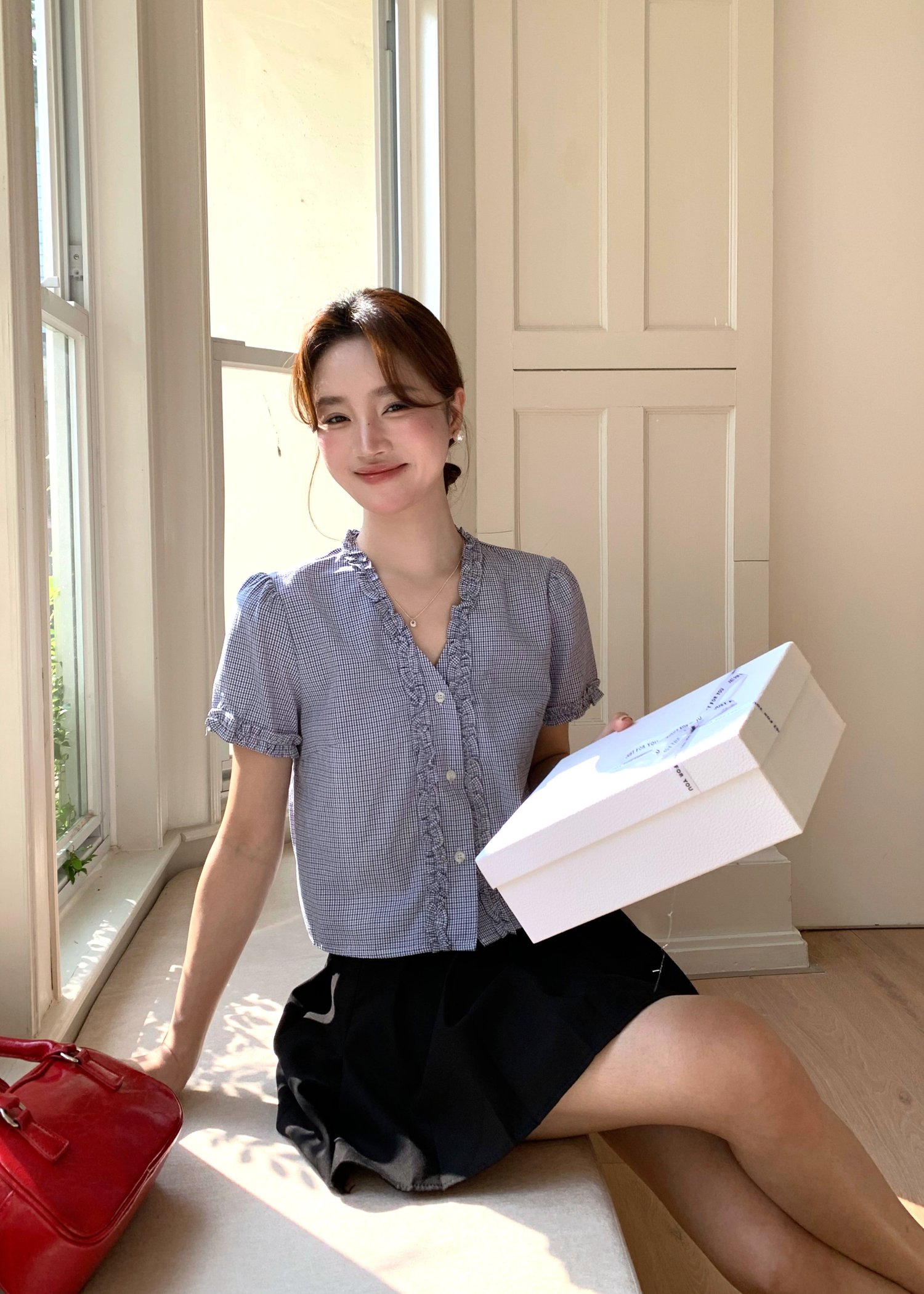 Leyra Checkered Ruffles Top in Blue