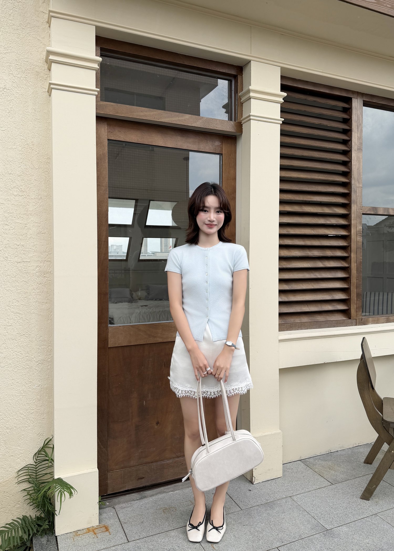 Daphne Buttoned Knit Top in Baby Blue