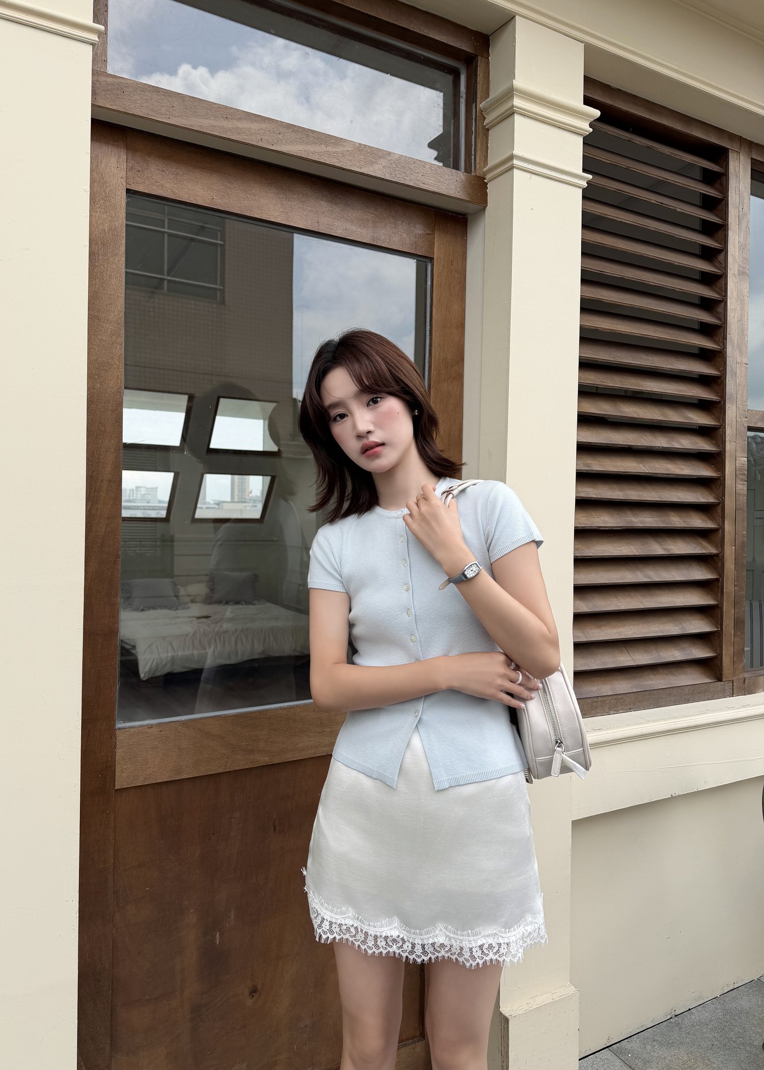 Daphne Buttoned Knit Top in Baby Blue